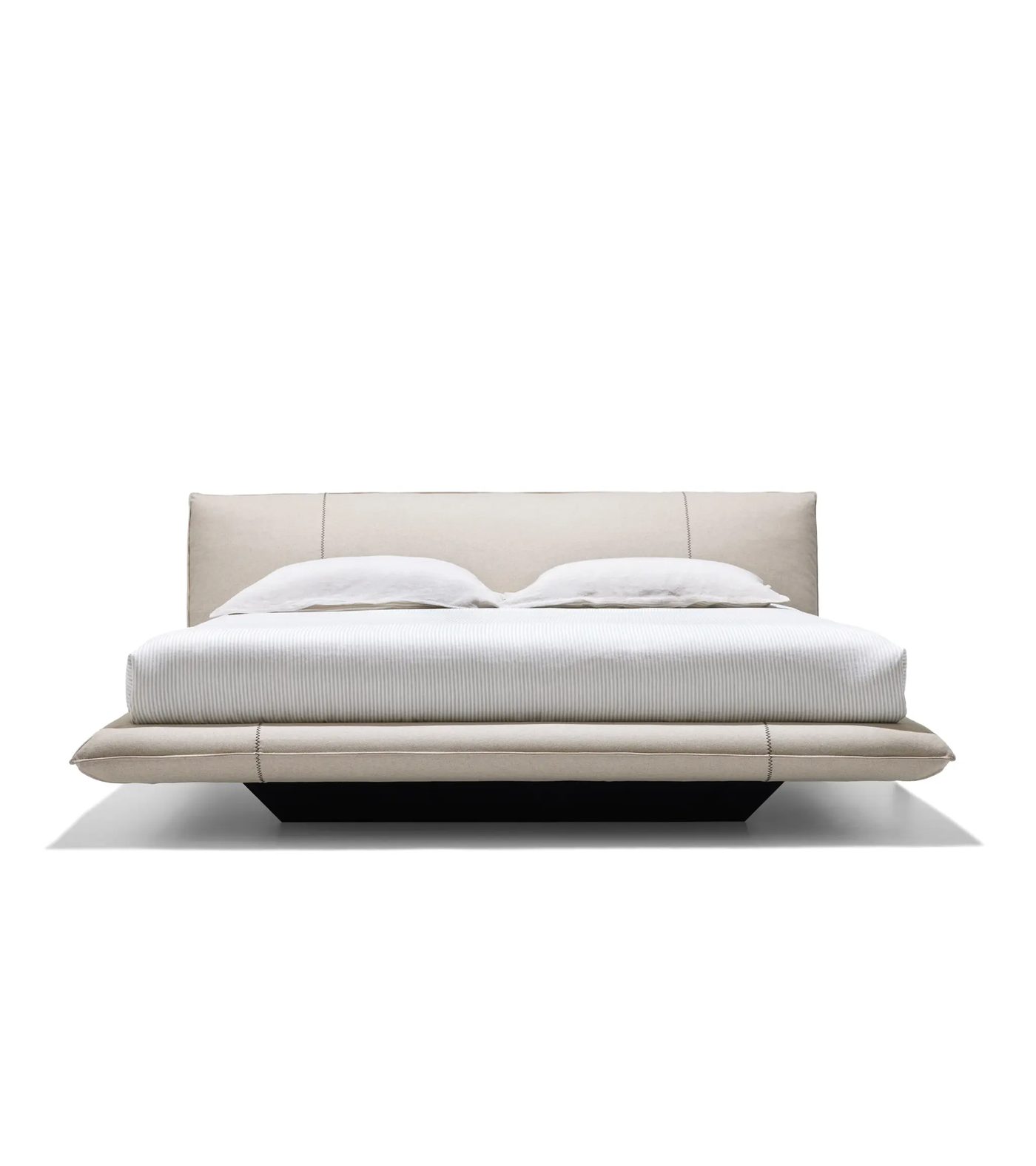 Vista frontale del letto beige con base sospesa